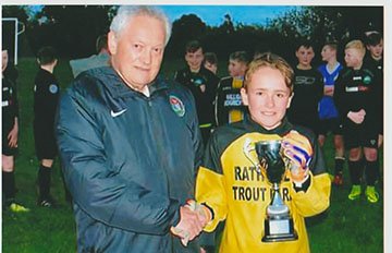 U13 Captain Cian O Callaghan   receiving League trophy 2016 - 2017